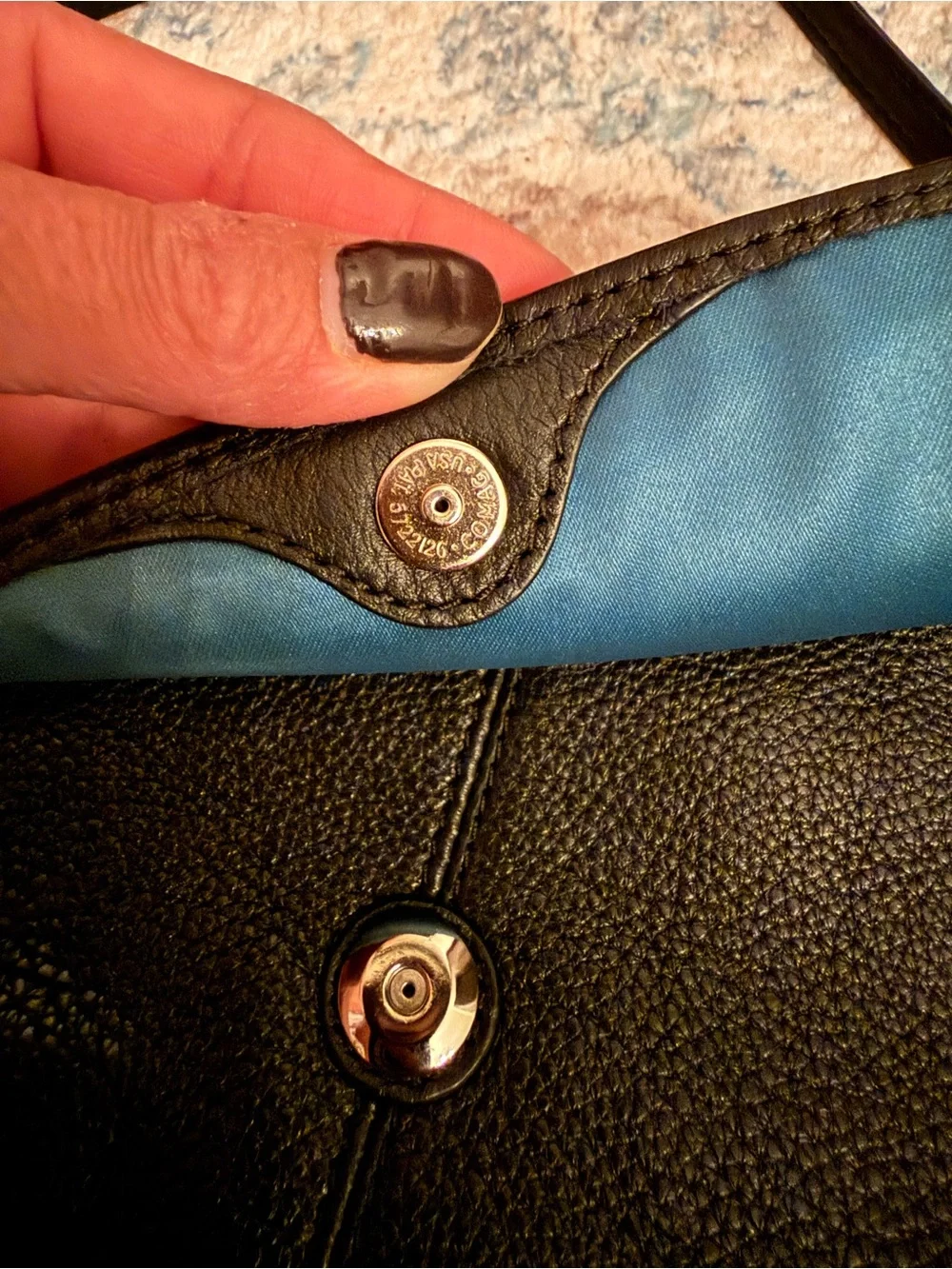 Black leather coach wristlet